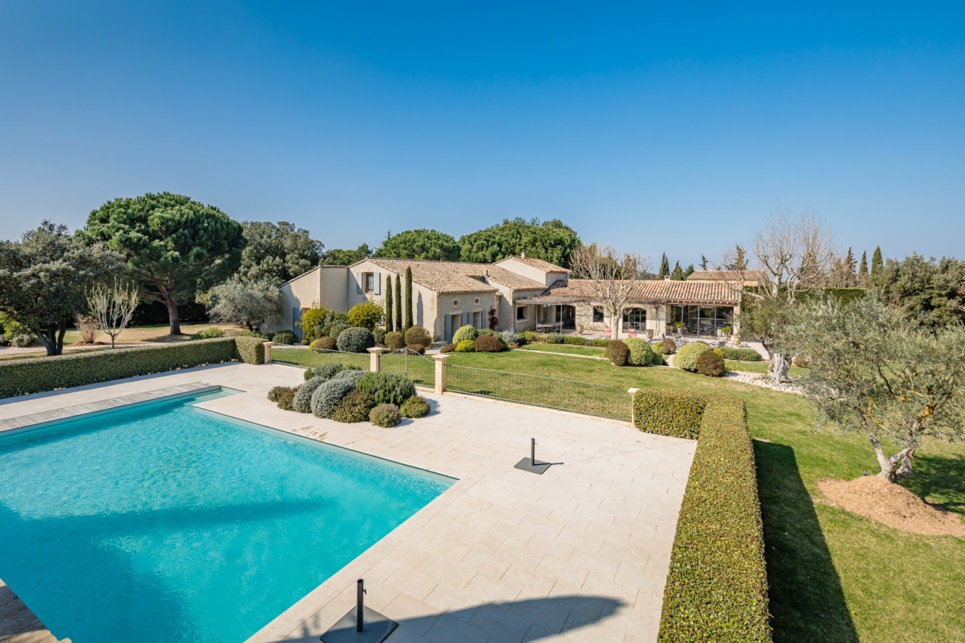 Pool and garden with exterior of property at Mas Laurent in Provence