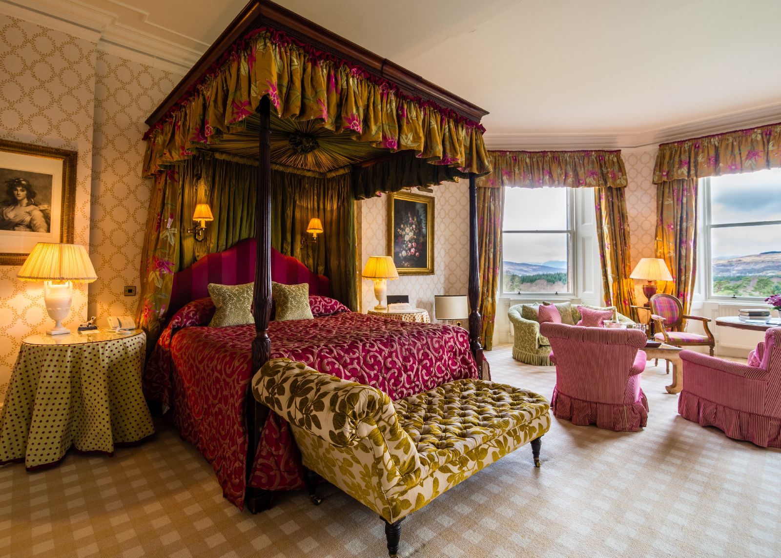 Spacious room with four poster bed at the Inverlochy Castle Hotel in Scotland