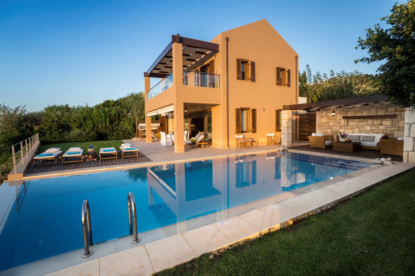 Pool and exterior view of Villa Anemos