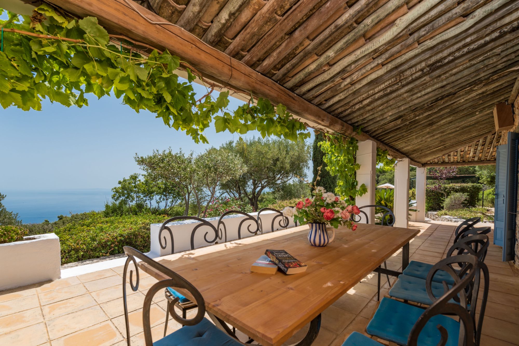 Outdoor dining area and terrace at Villa Ariane