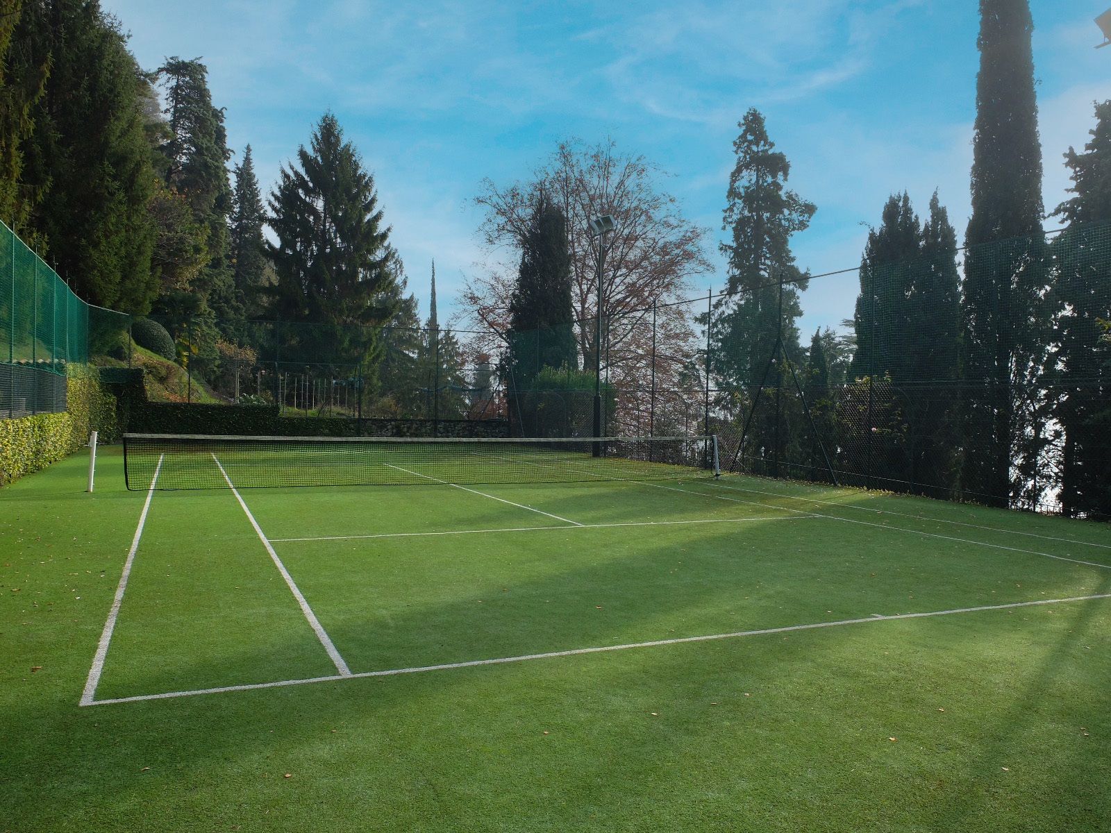 Tennis courts on the grounds of Villa La Cassinella in the Italian Lakes