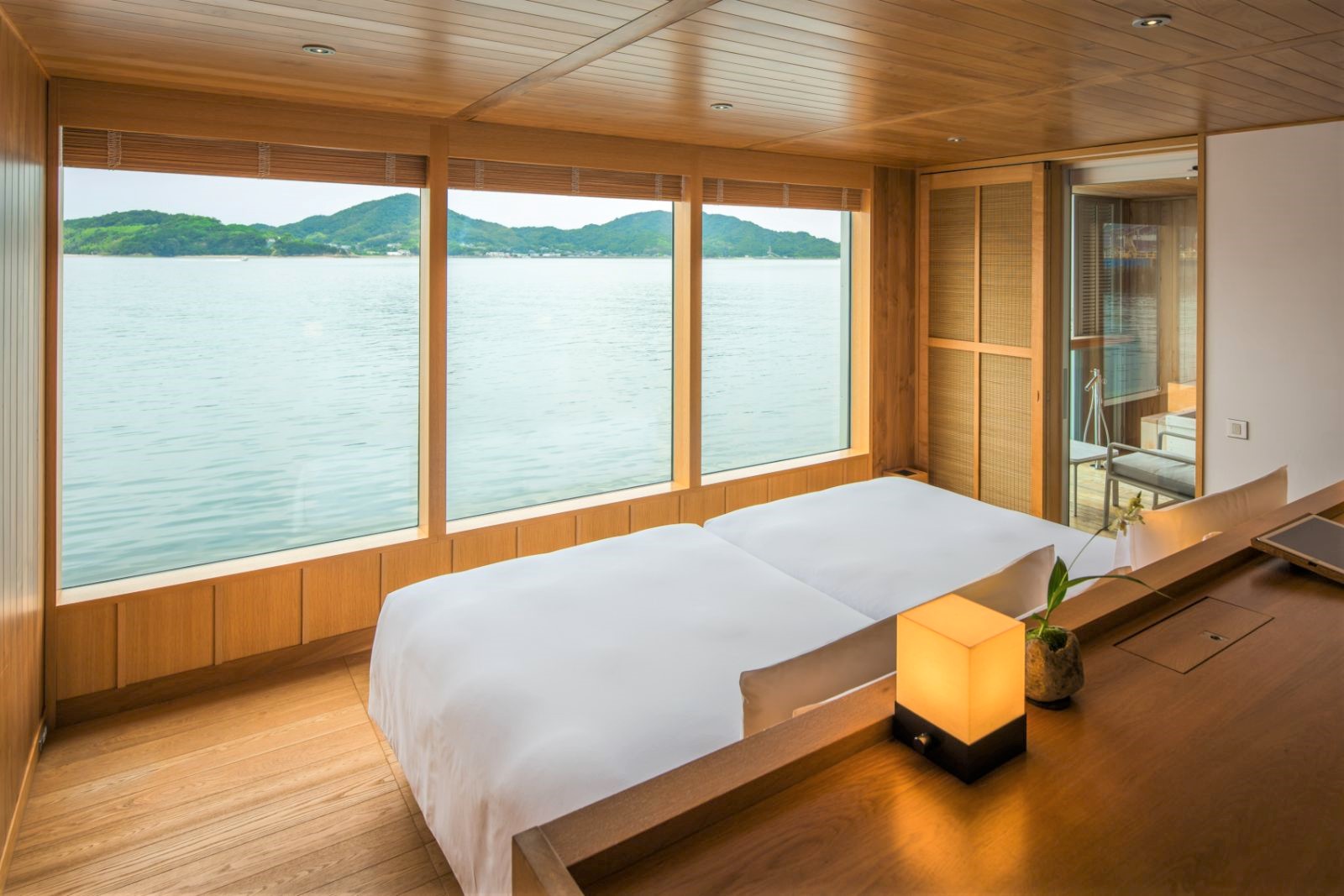 Guest cabin bedroom onboard guntû in Japan's Seto Inland Sea