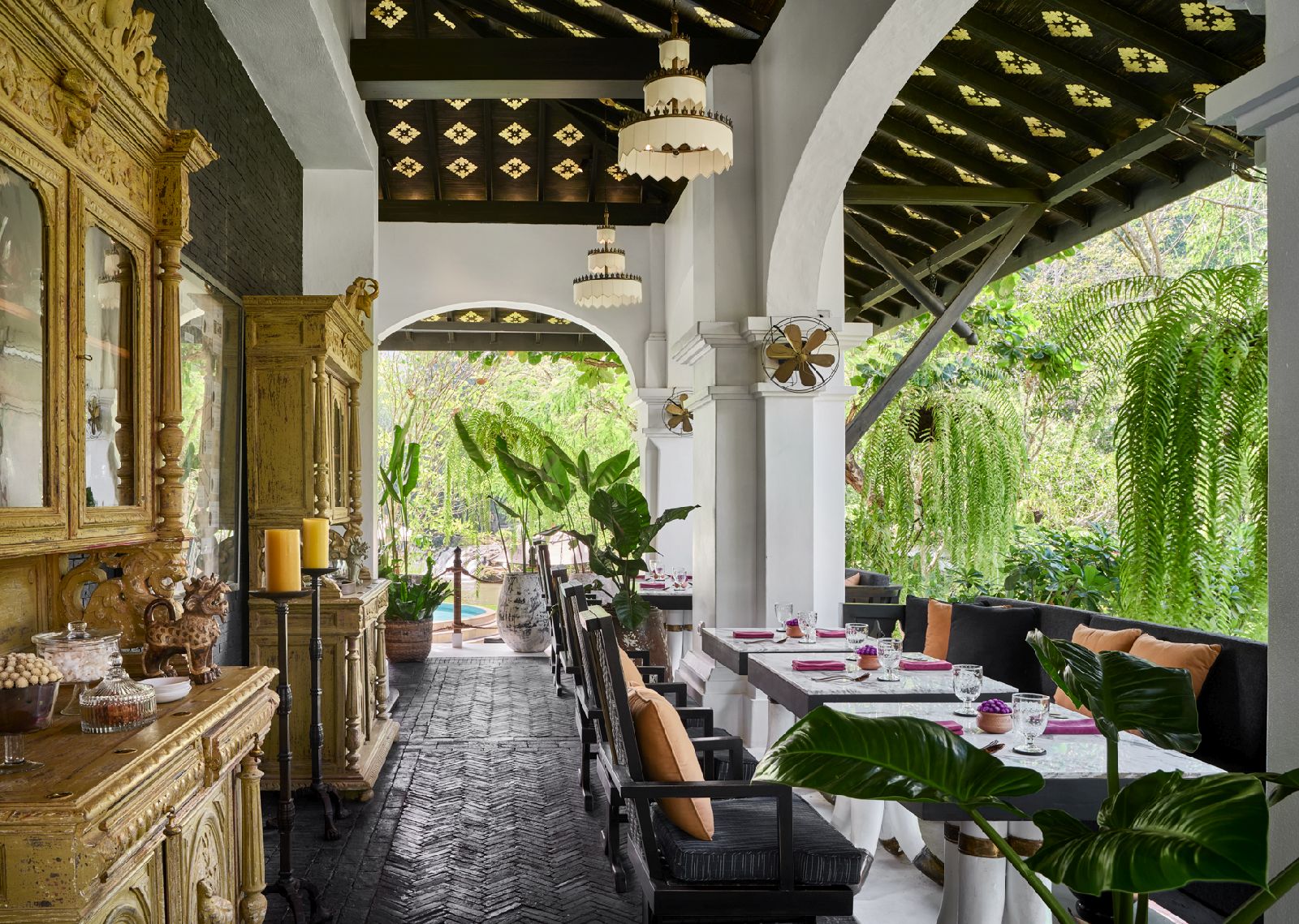 Elegant dining terrace of The Great House at the Rosewood Luang Prabang in Laos