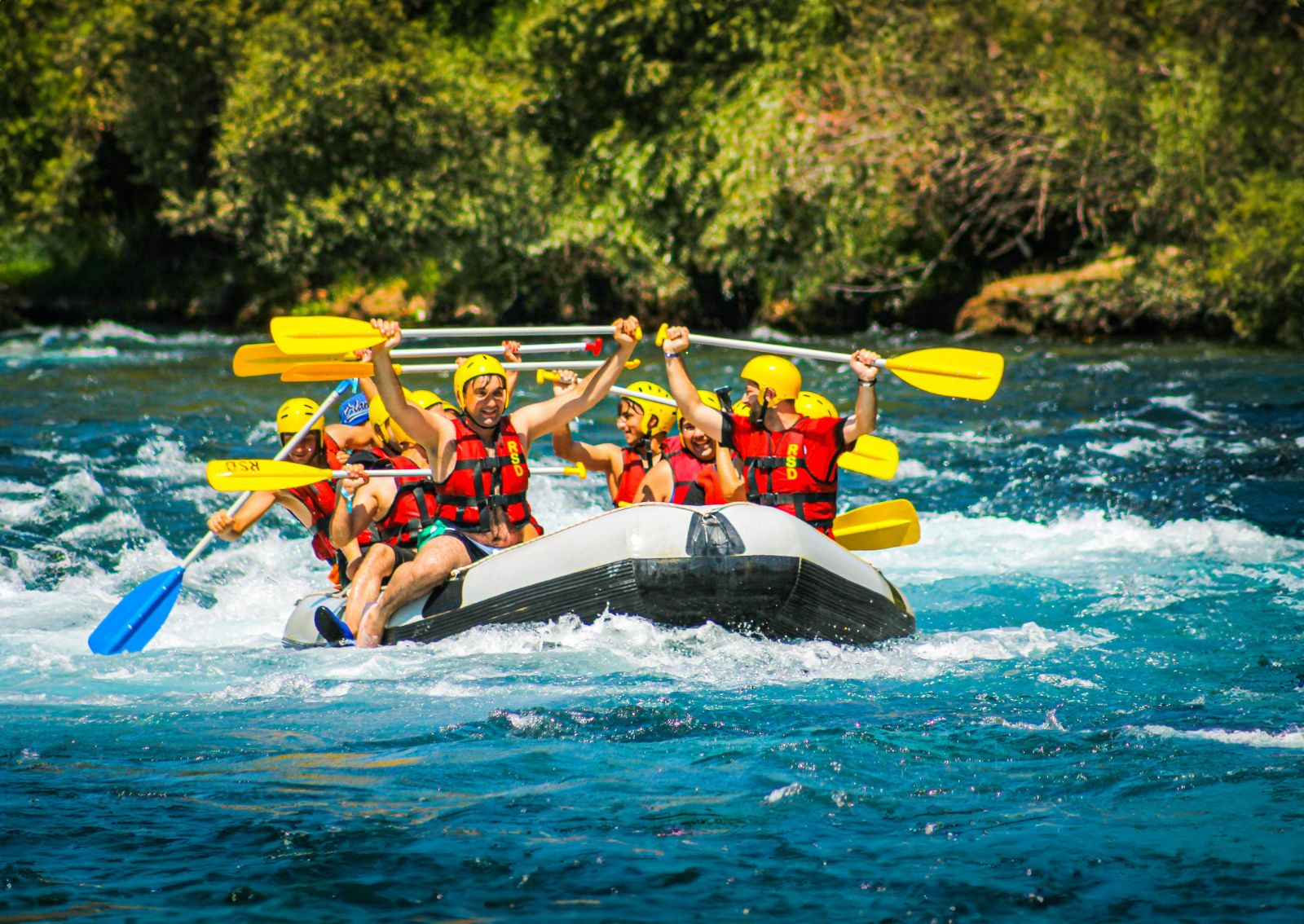 A group of people rafting on the Seti River