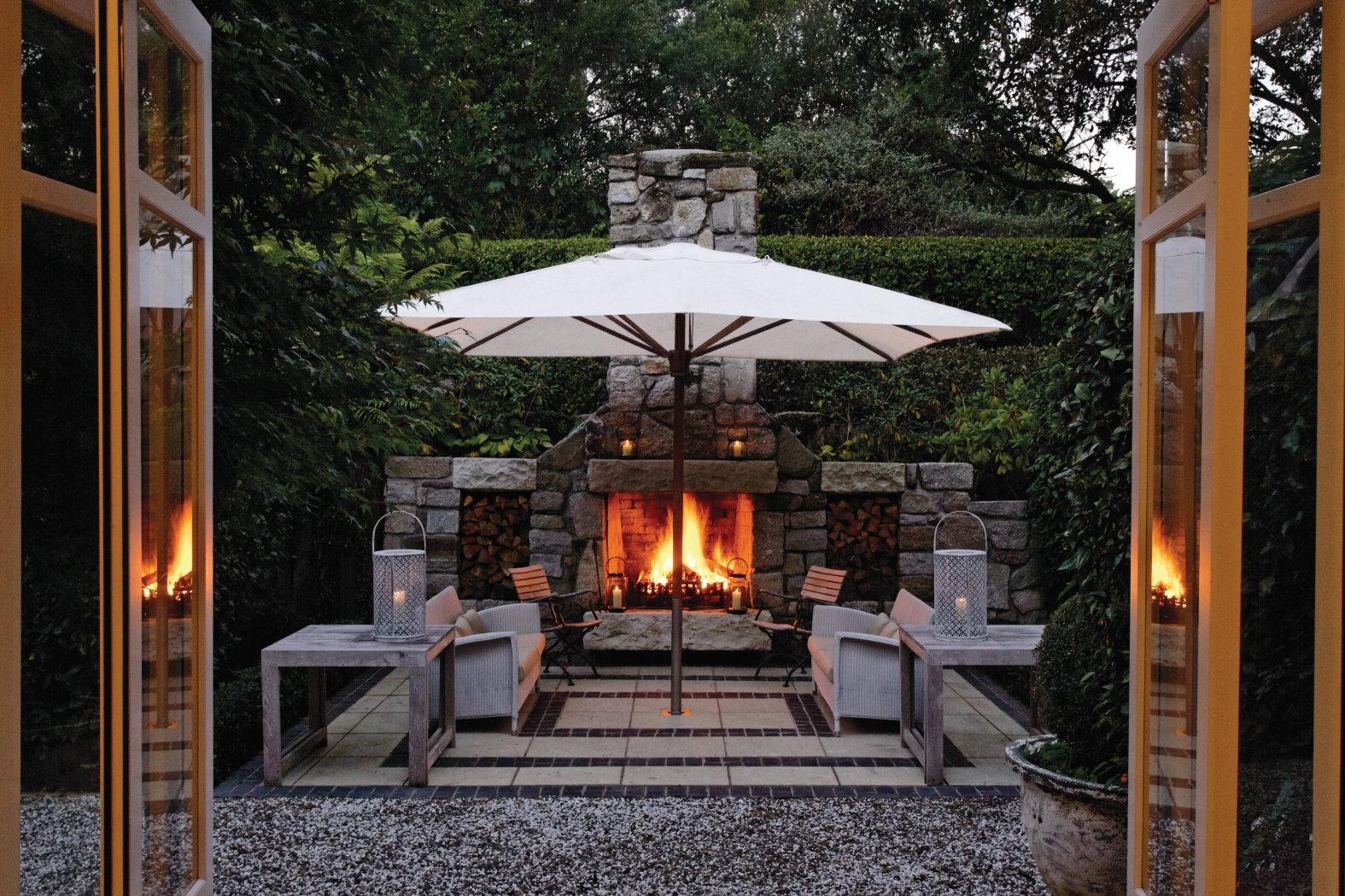 The outdoor fireplace of the owners cottage at Huka Lodge, New Zealand