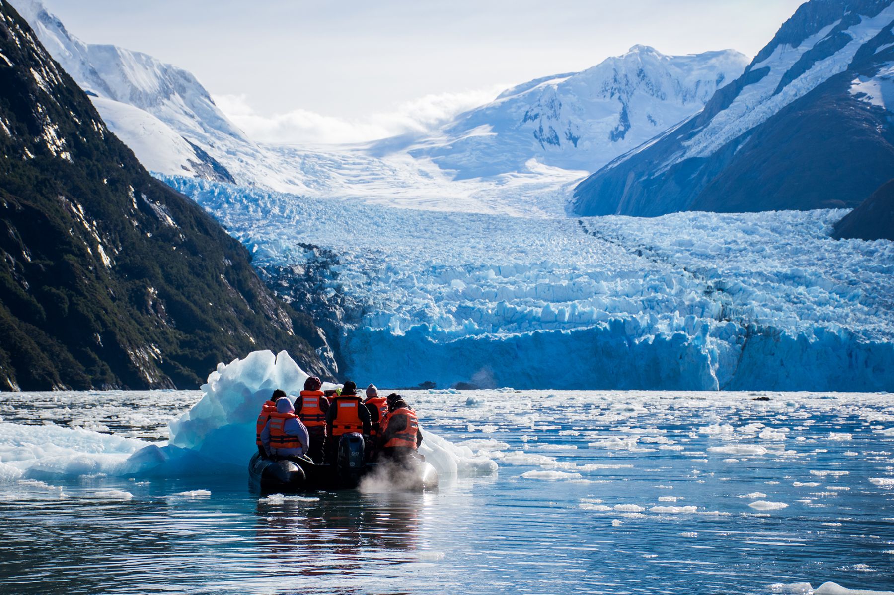 Guests of the Stella Australis in Patagonia on an iceberg and glacier Zodiac cruise