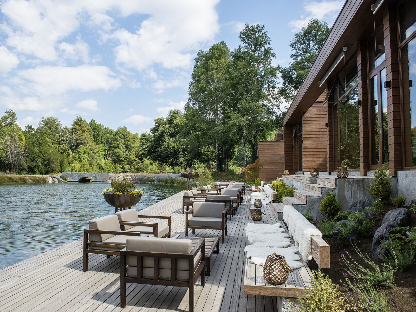 outdoor lounge next to the water