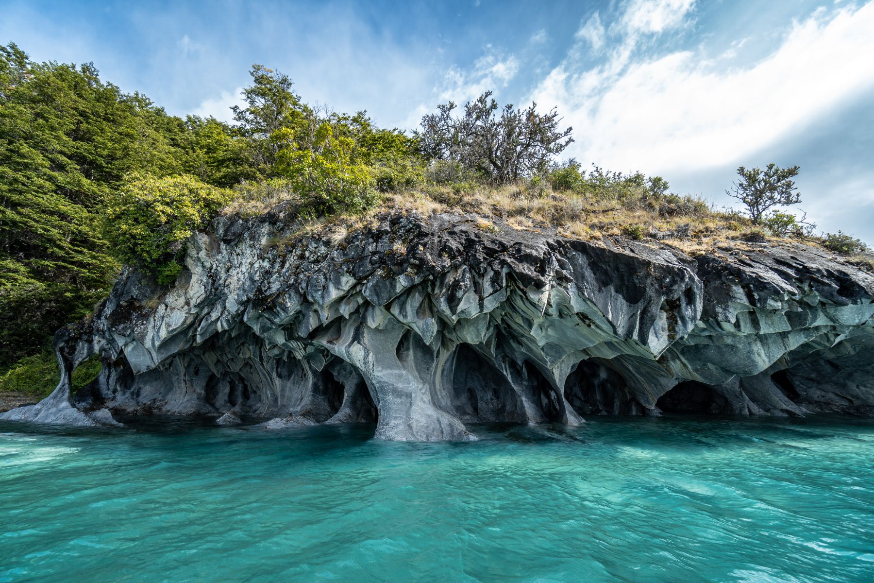 Turquoise water of Lake General Carrera and the Marble Caves in Chile