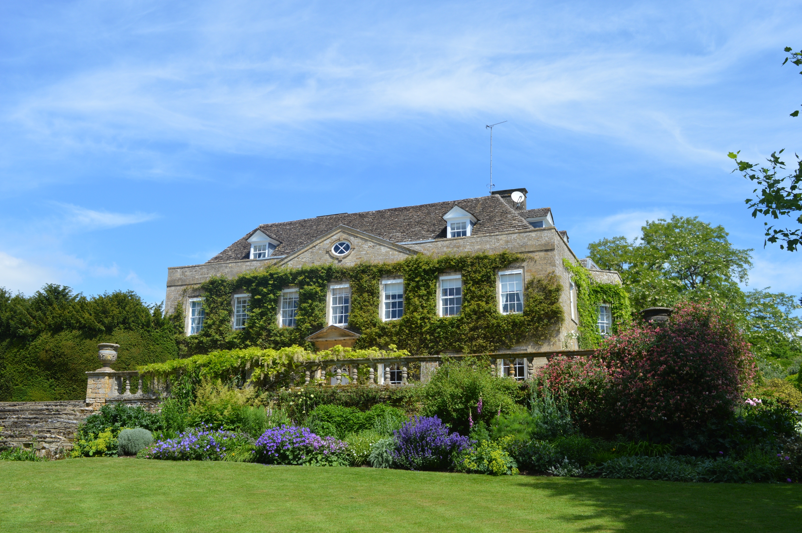 Facade with grounds of Cornwell Manor, Cotswolds