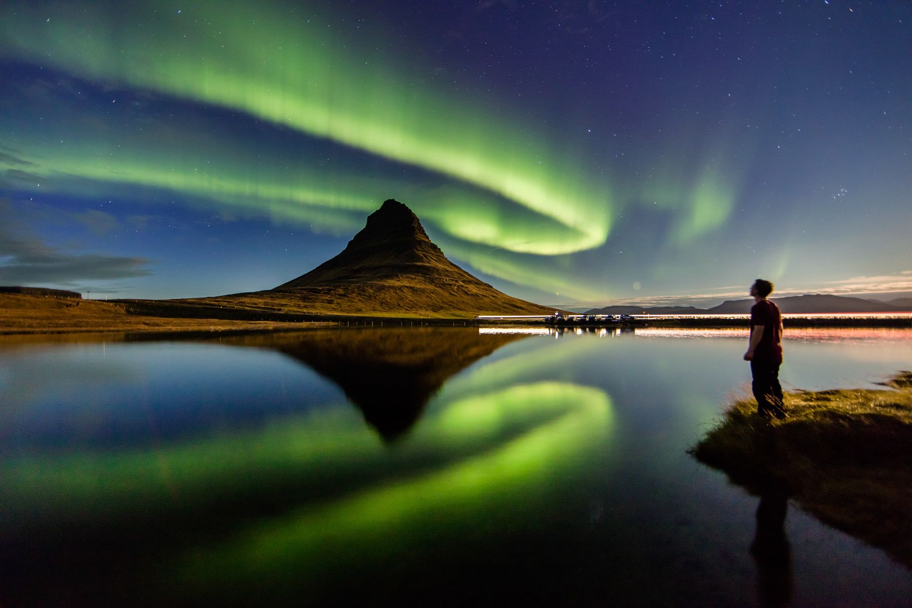 Reflection of Kirkjufell and the northern lights in Iceland