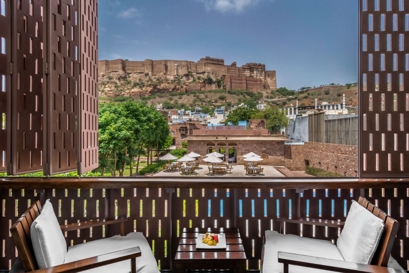 Suite balcony with views of Mehrangarh Fort at RAAS Jodhpur in the Rajasthan region of India