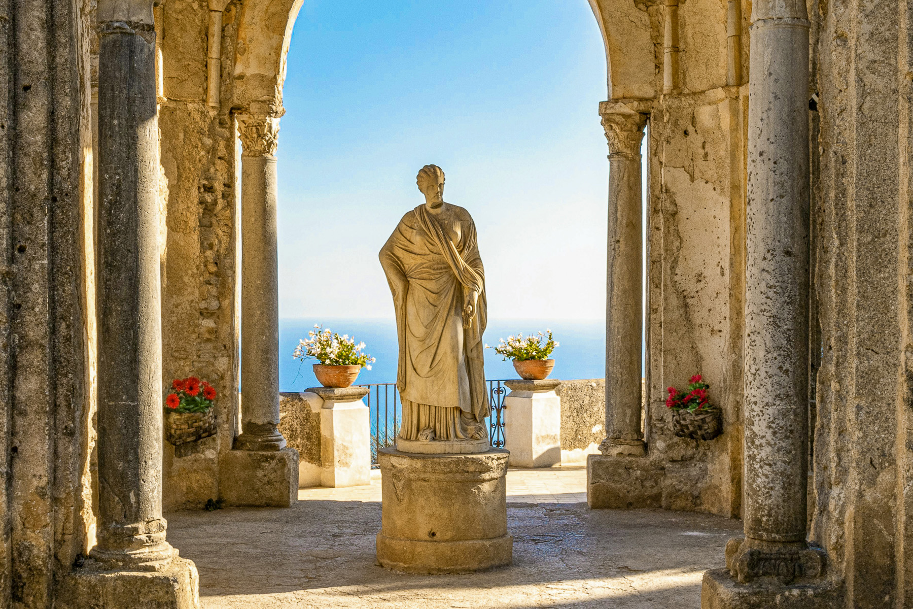 A statue overlooking the ocean in Ravello on the Amalfi Coast