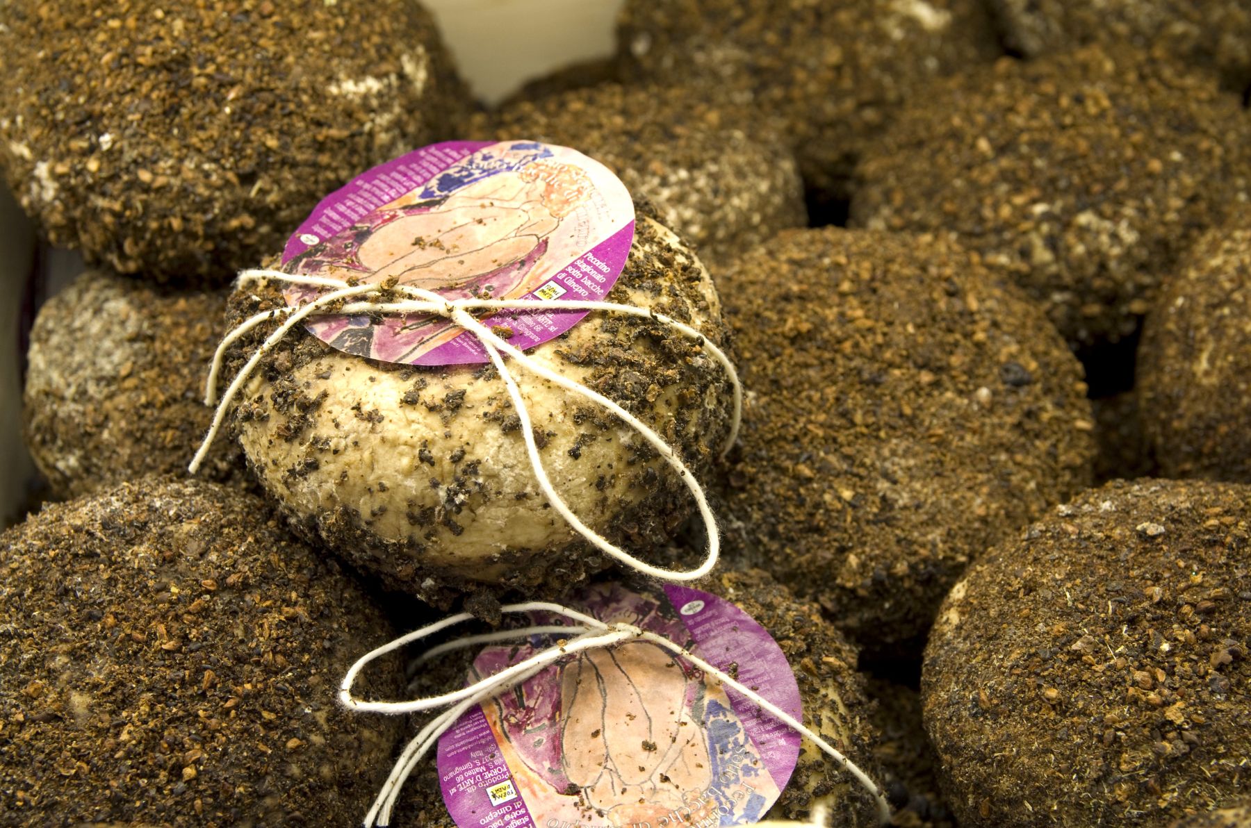 Pecorino cheese in Italy wrapped in rustic packaging