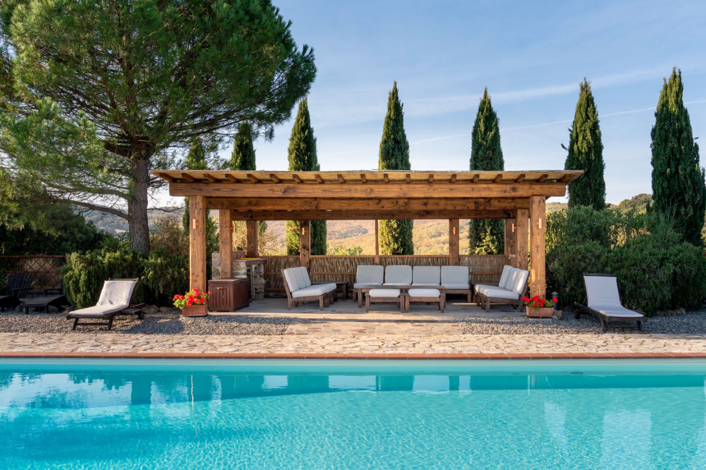 A covered outdoor seating area at Villa San Barberino.