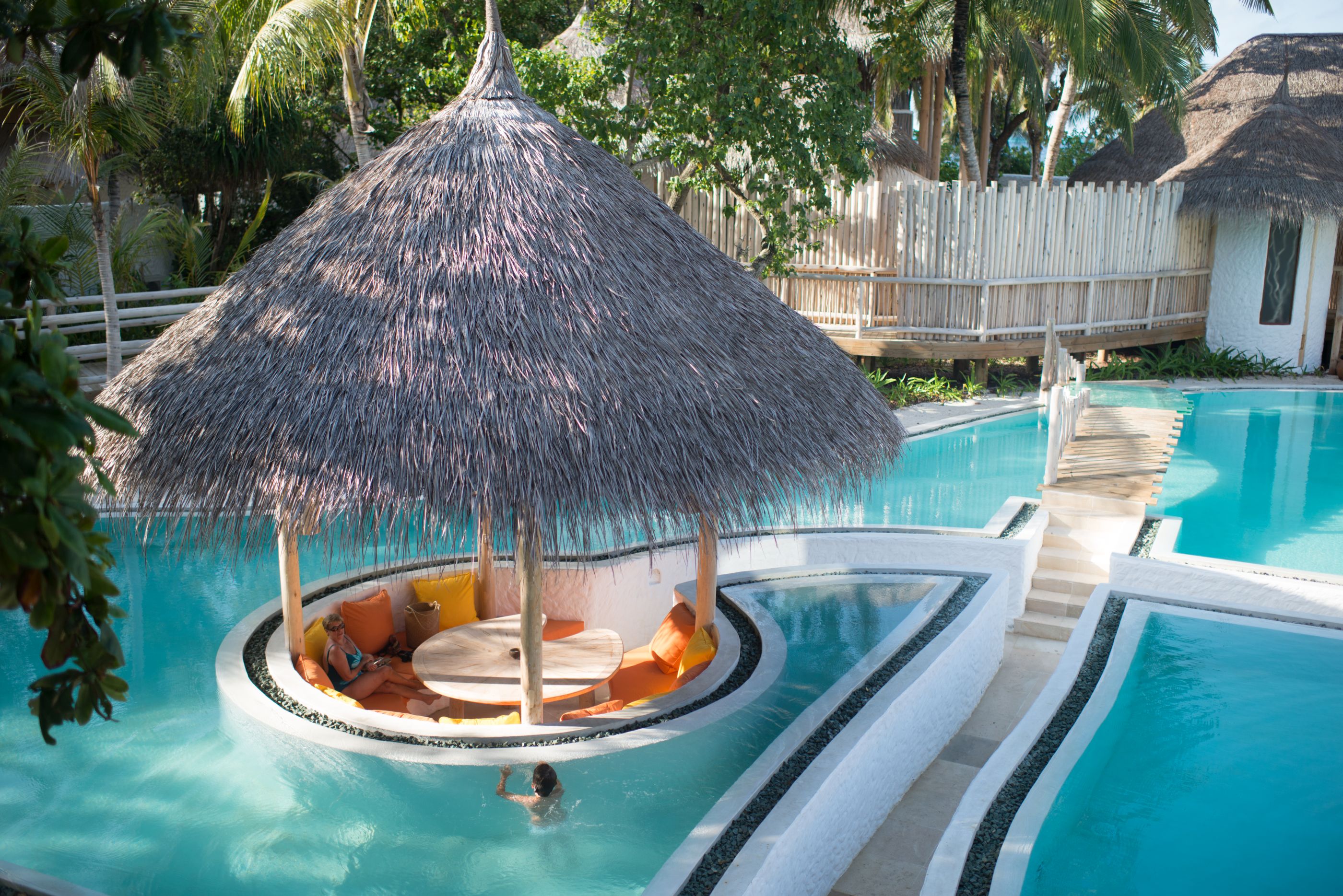 Swimming pool with lowered seating area at Soneva Fushi, Maldives