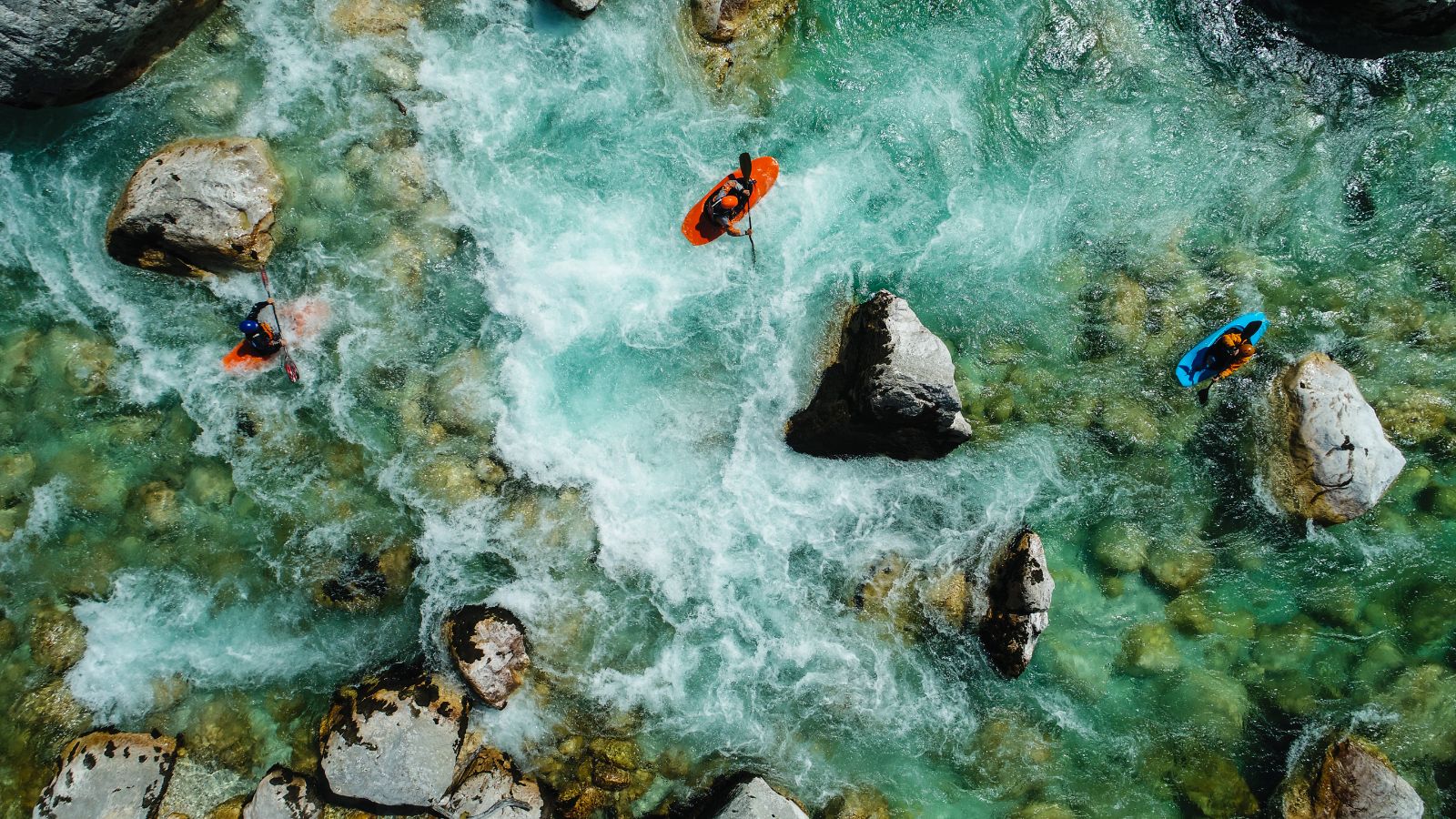 Whitewater kayaking along the Soca River in Slovenia