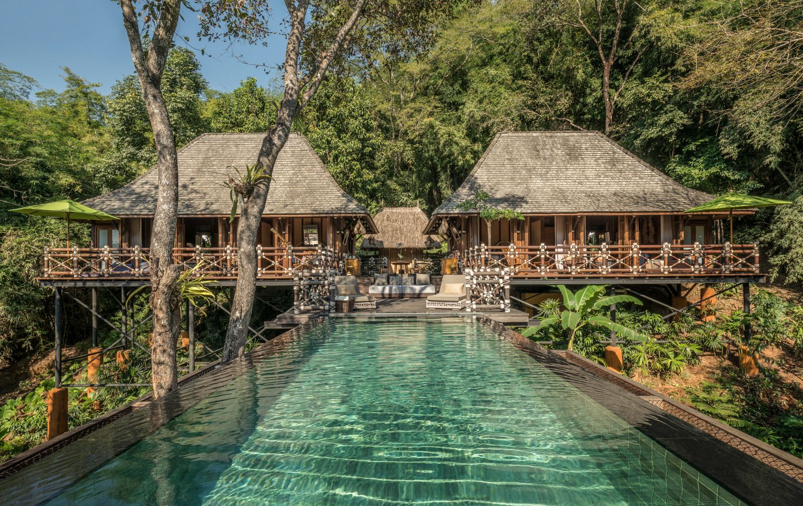 Pool and exterior of a tent at Four Seasons Tented Camp Golden Triangle in Chiang Rai