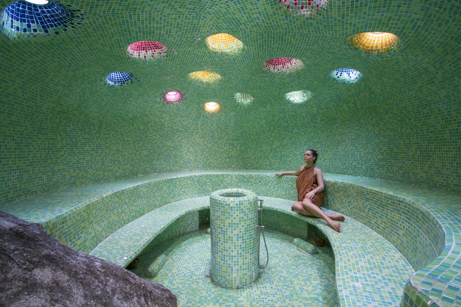 Woman enjoying the steam room at luxury resort Kamalaya in Koh Samui, Thailand