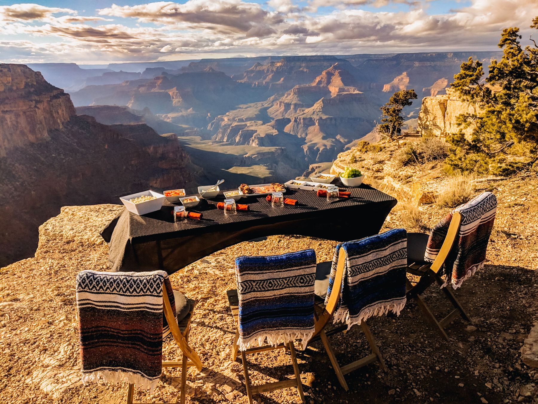 Table set out for lunch overlooking the Grand Canyon on an EXP Journeys adventure