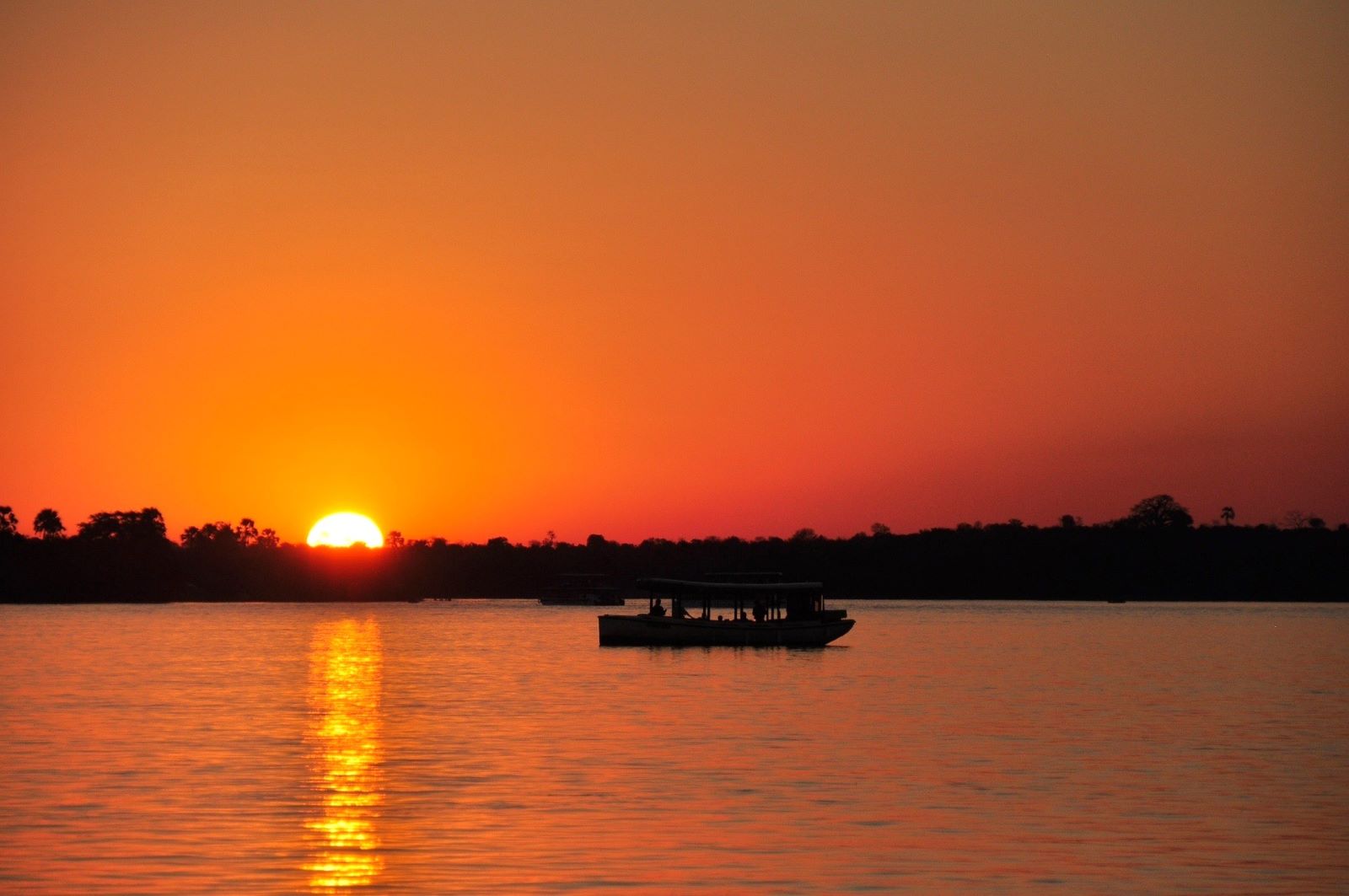A boat cruise on the Zambezi River at sunset