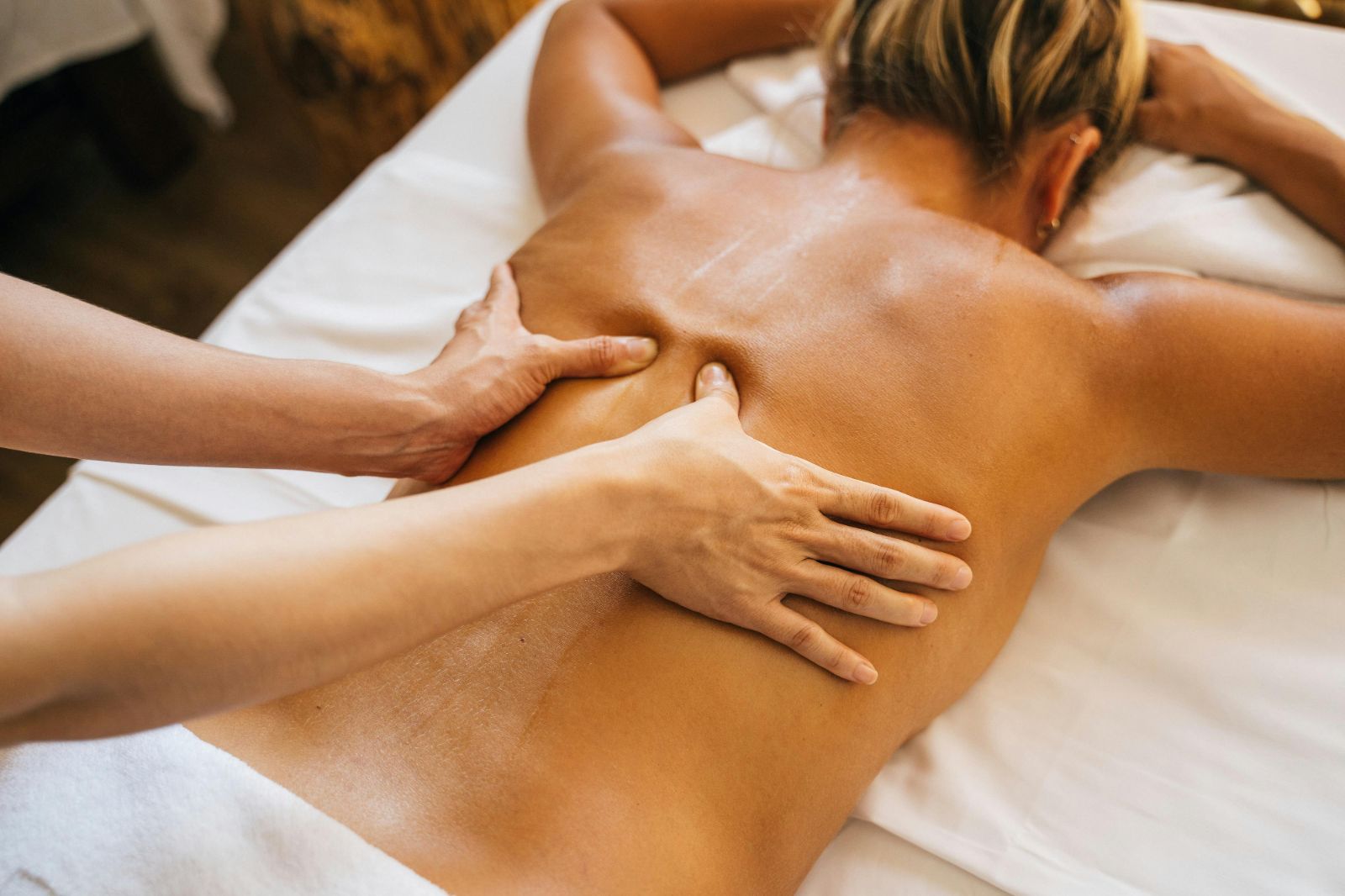 A woman enjoying a back massage